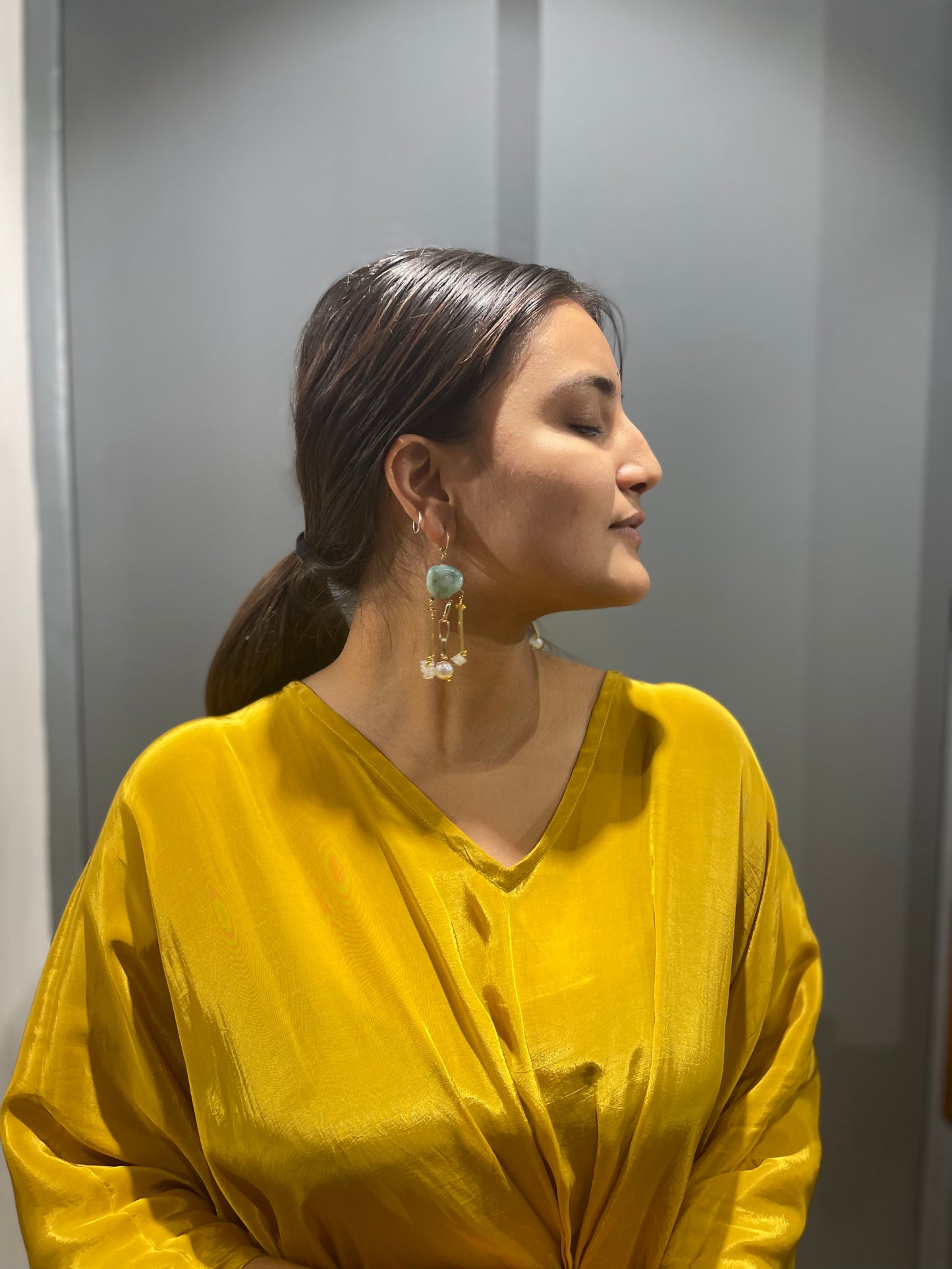 Feather Touch Dangler  Earrings